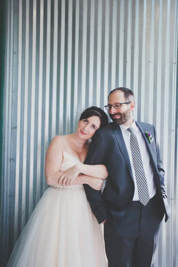 Bride and groom portrait at urban Seattle-area wedding venue. Lovely Events.