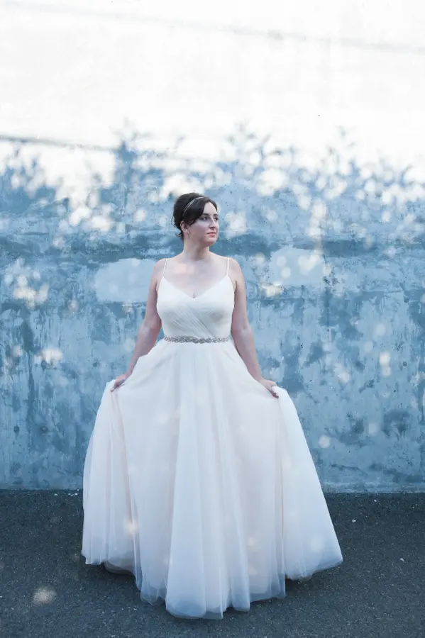 Bride in wedding dress at outdoor Seattle-area wedding. Lovely Events.