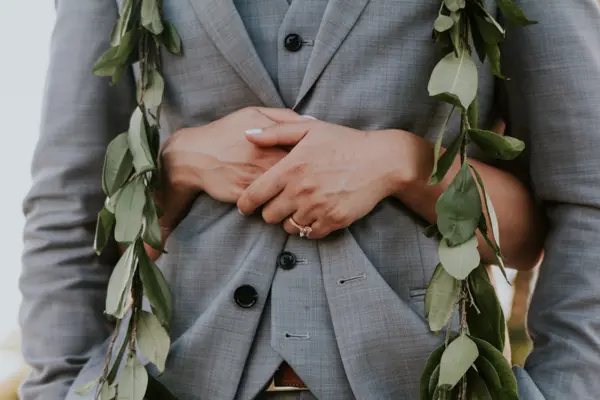 Bride and groom embrace at outdoor Washington wedding. Lovely Events.